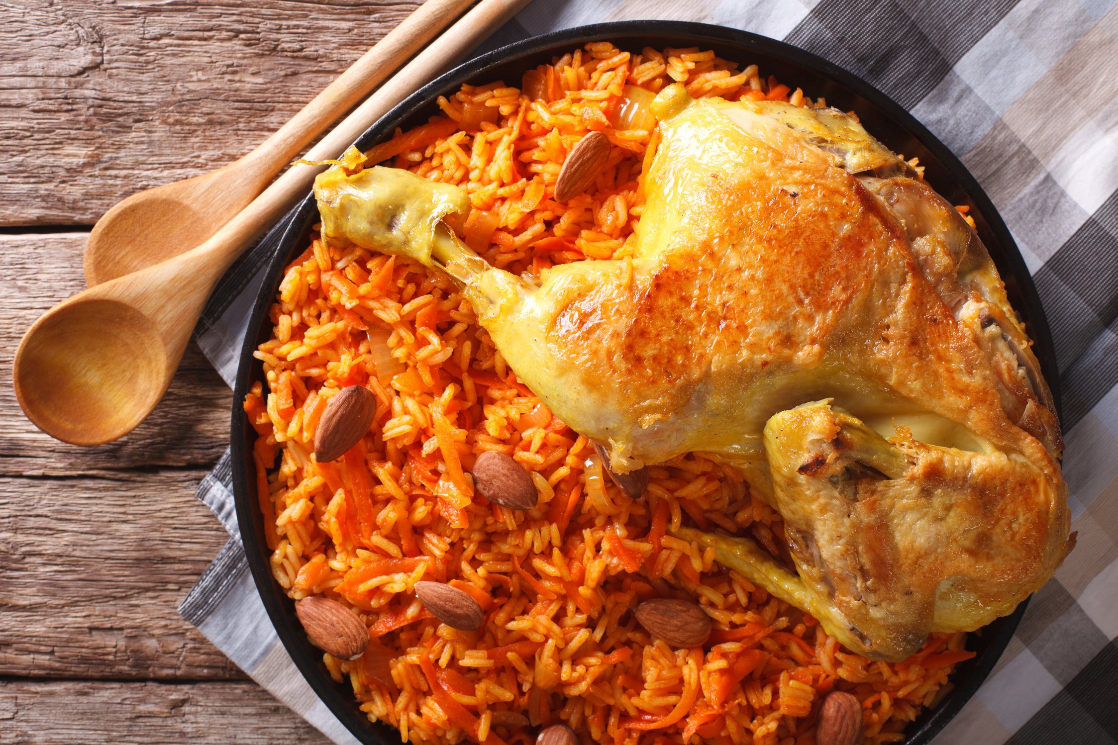 Arabic Food Kabsa: chicken with rice and vegetables close-up